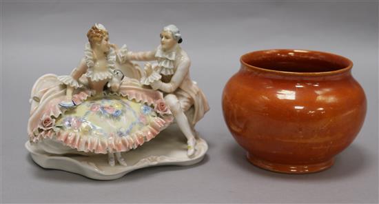 A Karl Ens group and a Moorcroft orange lustre vase